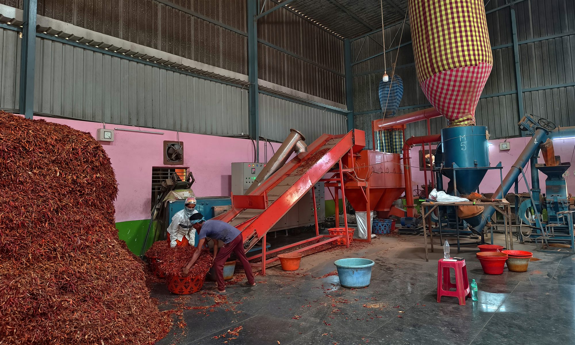 Chilli powder processing and finished powder stock at Gaman Impex
